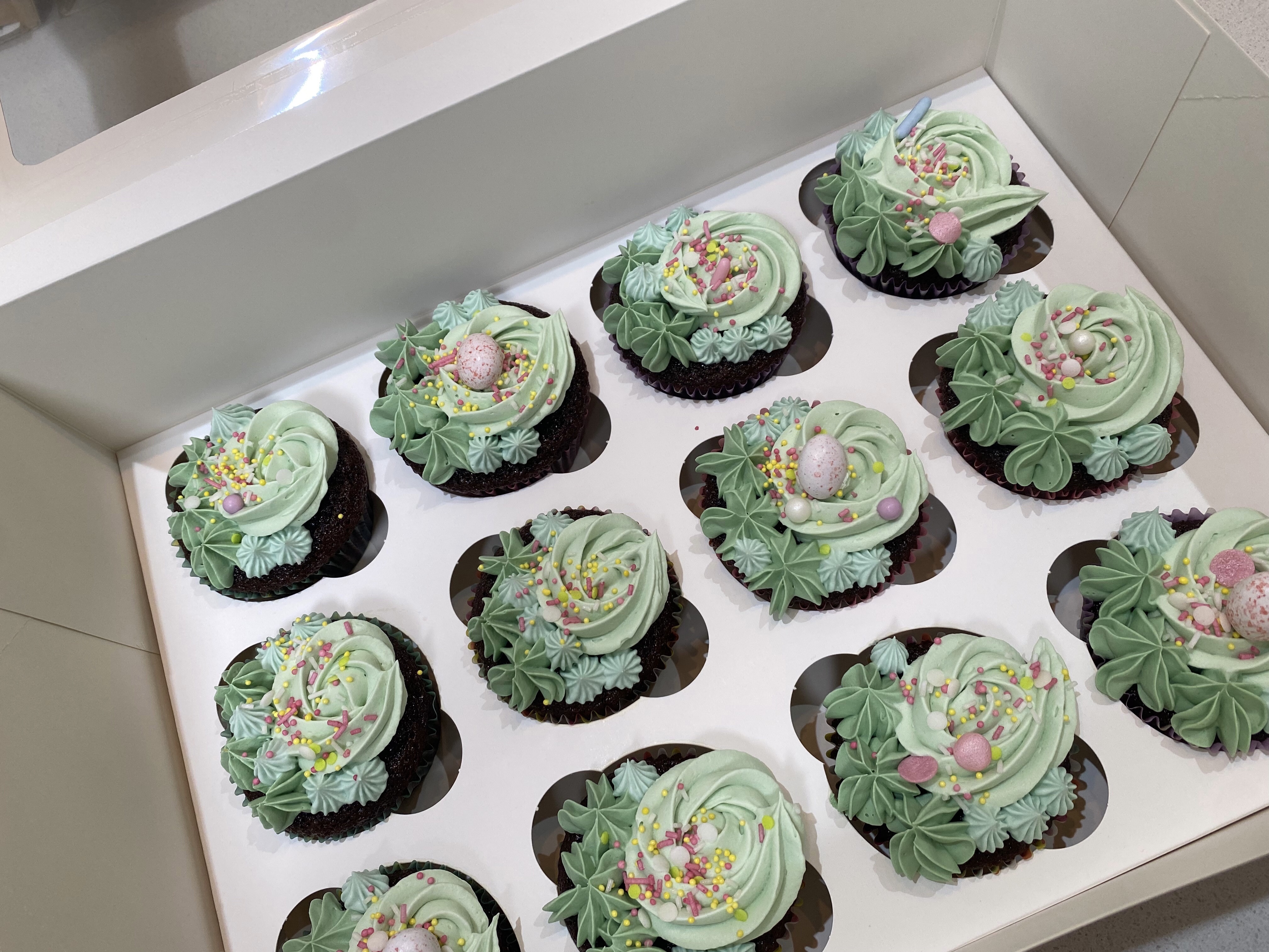 Chocolate cupcake, milk chocolate and white chocolate ganache with vanilla buttercream and some sneaky chocolate eggs